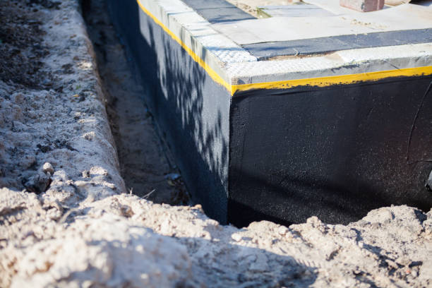 Professional Waterproofing technician working in Hackensack, NJ